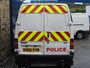 Ford Transit Mk6 combi van (part panel van, part minibus) used as local patrol vehicle with prisoner cage in rear, built 2000-2006 (c) 2013 Vision Motor Services Ltd