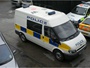 Ford Transit Mk6 combi van (part panel van, part minibus) used as local patrol vehicle with prisoner cage in rear, built 2000-2006 (c) 2013 Vision Motor Services Ltd
