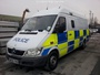 Mercedes Benz Sprinter Mk1, kitted out with prisoner transport cells in load carrying area with side and rear loading doors - with modern yellow/blue batternburg side markings, built 1995-2006 (c) 2019 Vision Motor Services Ltd